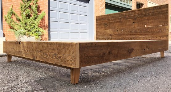 Queen size bed made from 100% reclaimed materials